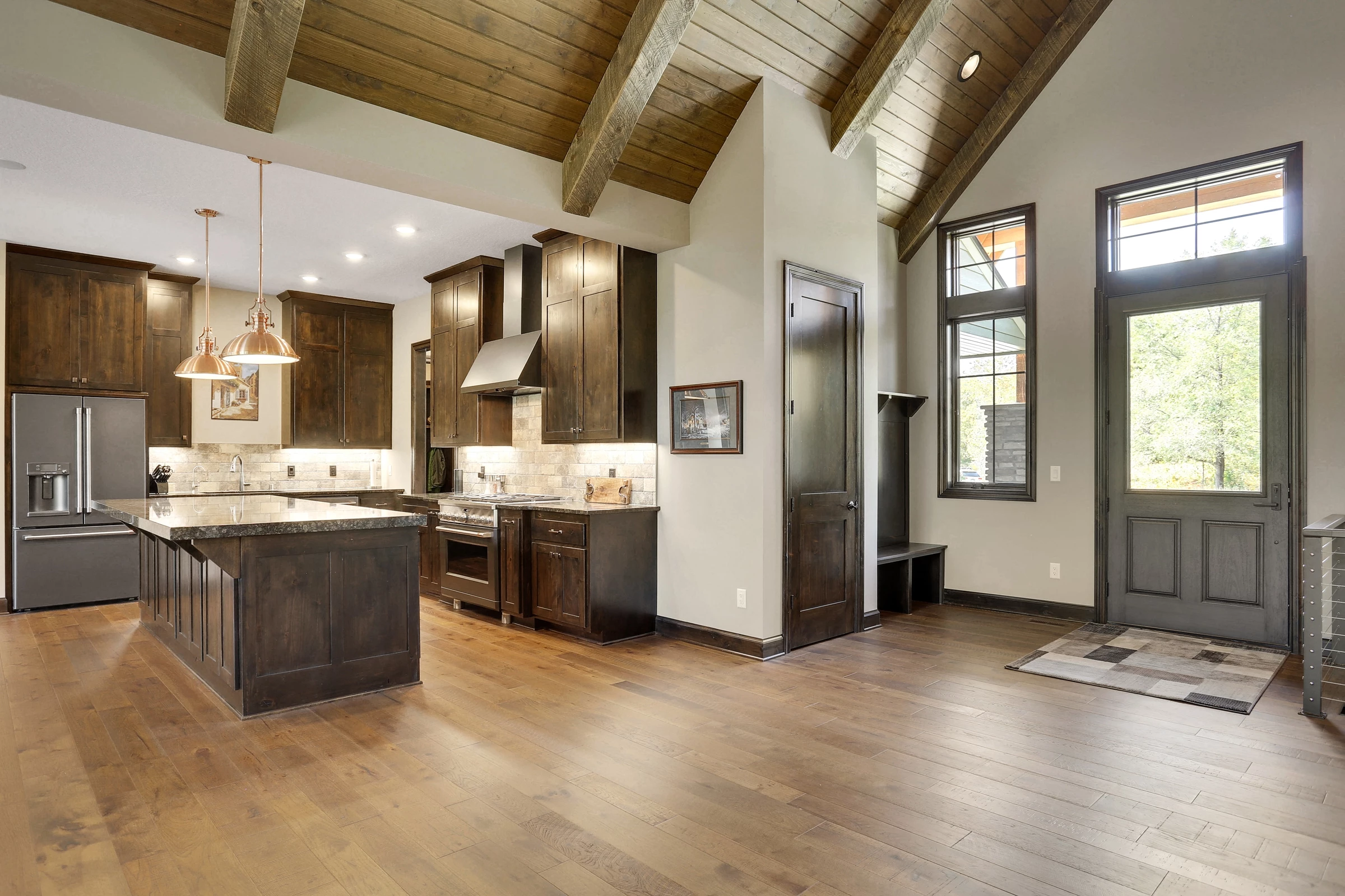 Wood Floors Open Vaulted Plan
