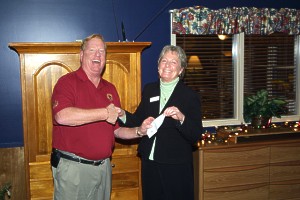 Tom Budzynski Presents $10,000 to Alexandra House