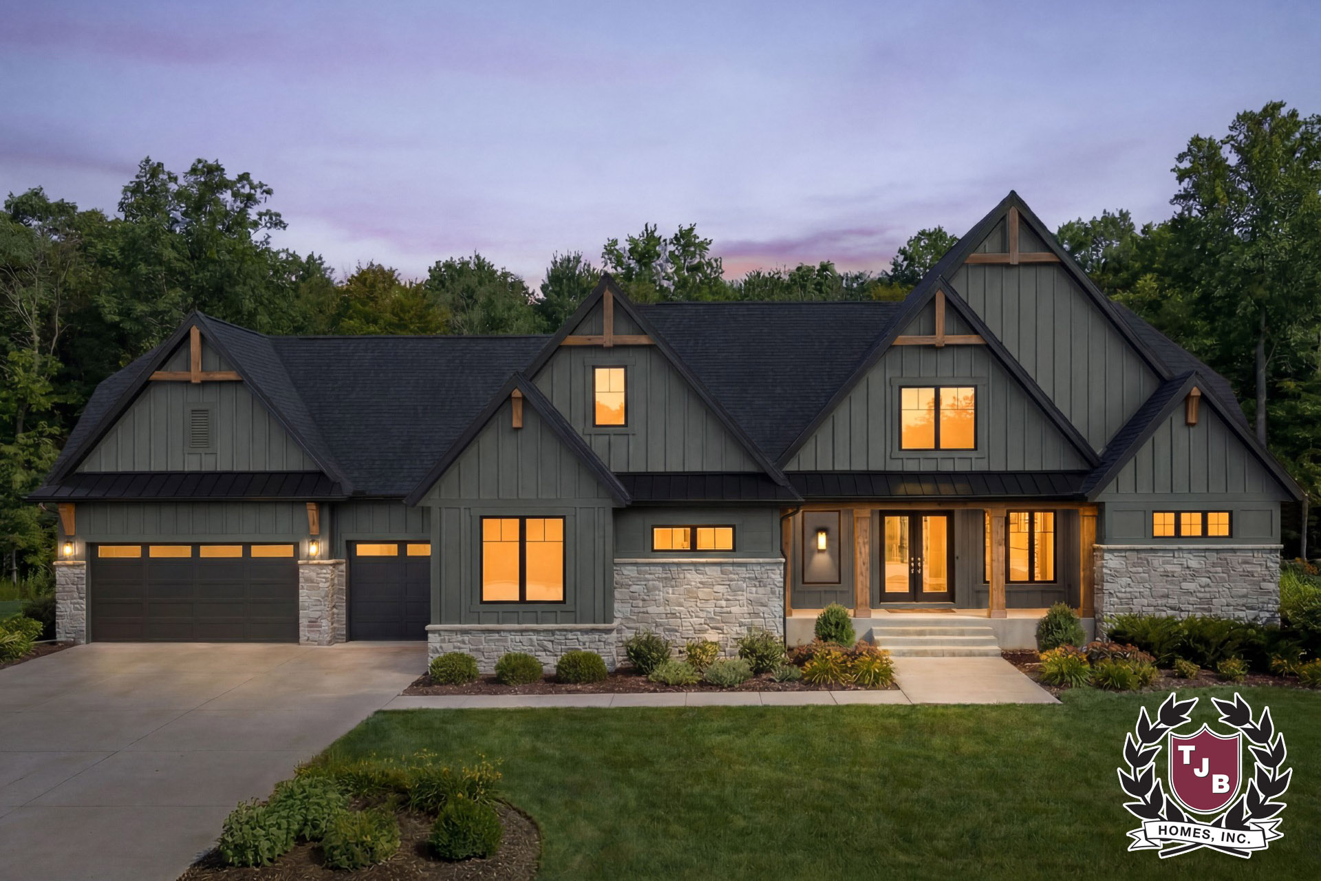 The Christina luxury 1.5 story home front elevation with 4 car garage and vaulted great room design