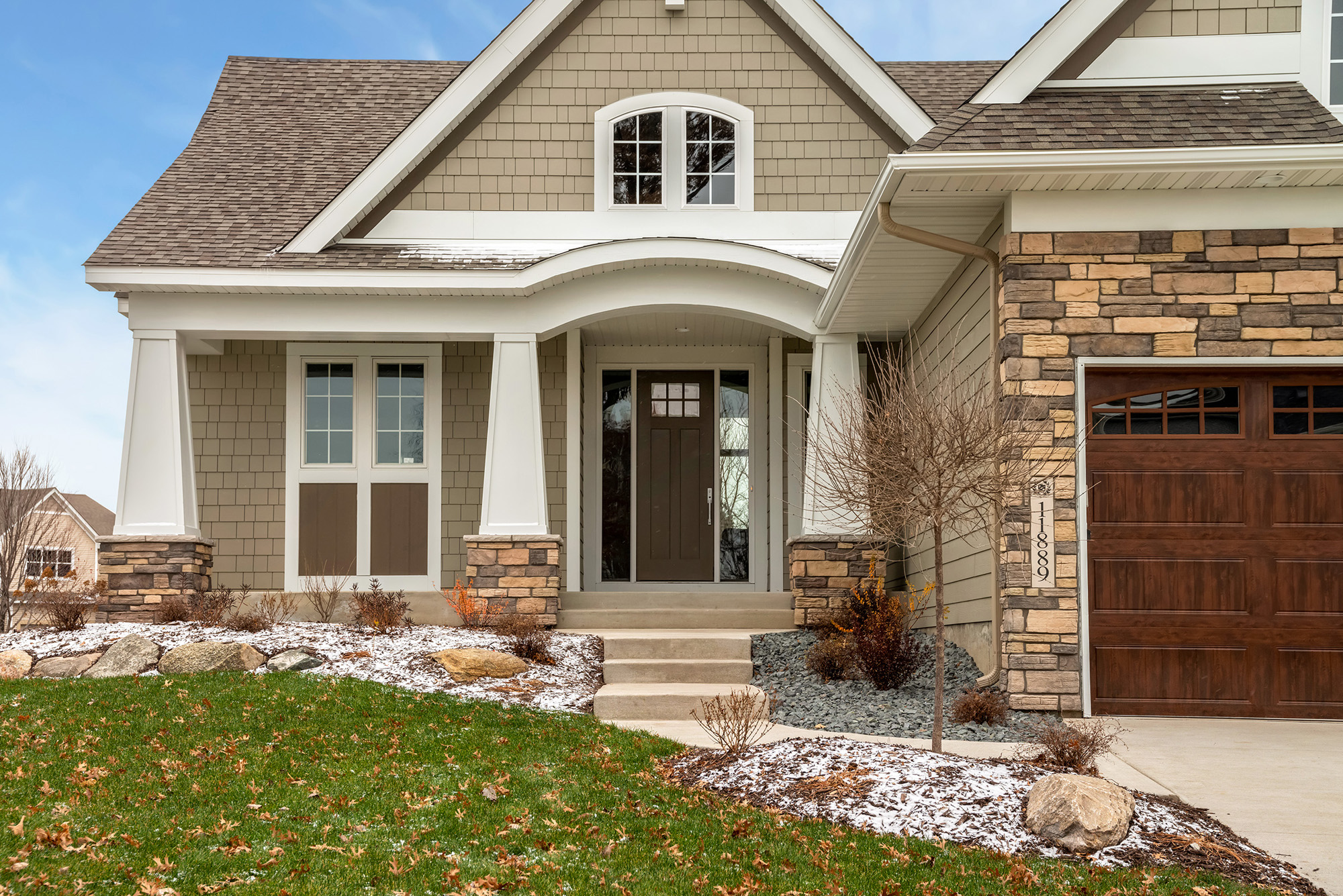 Arched grand entry and front porch