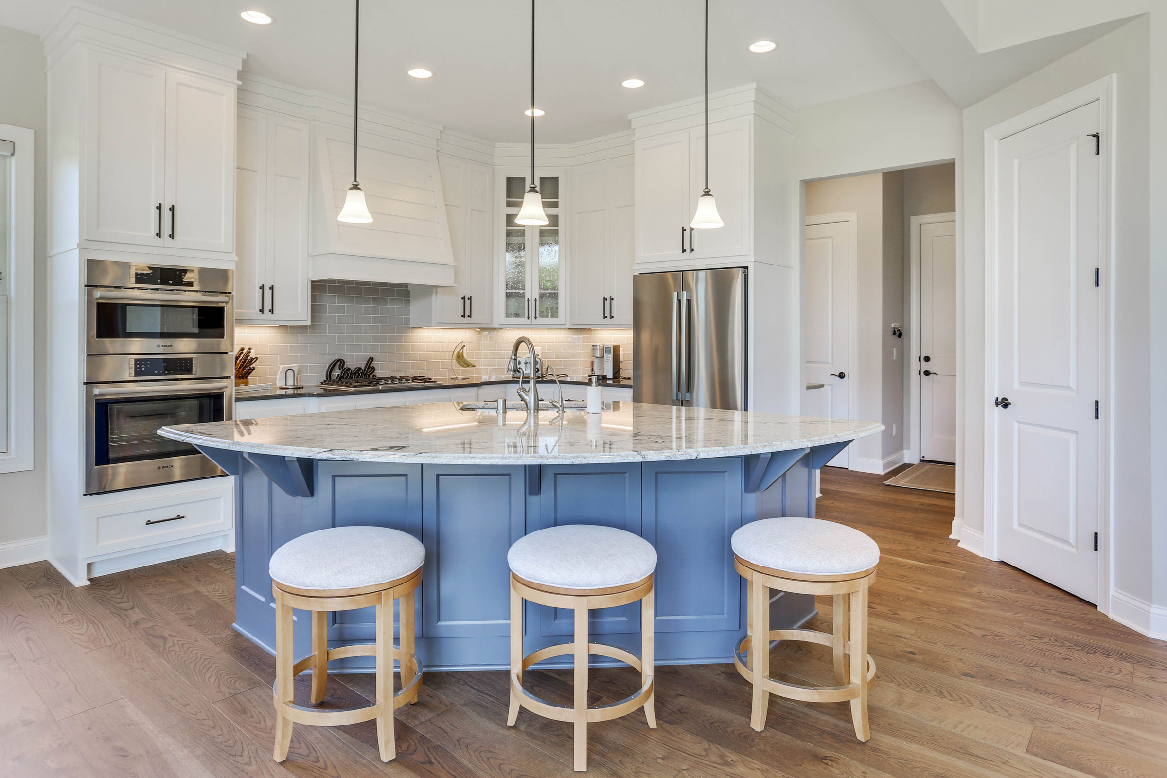 TJB Home Plan #499 White Kitchen with Blue Accent Island
