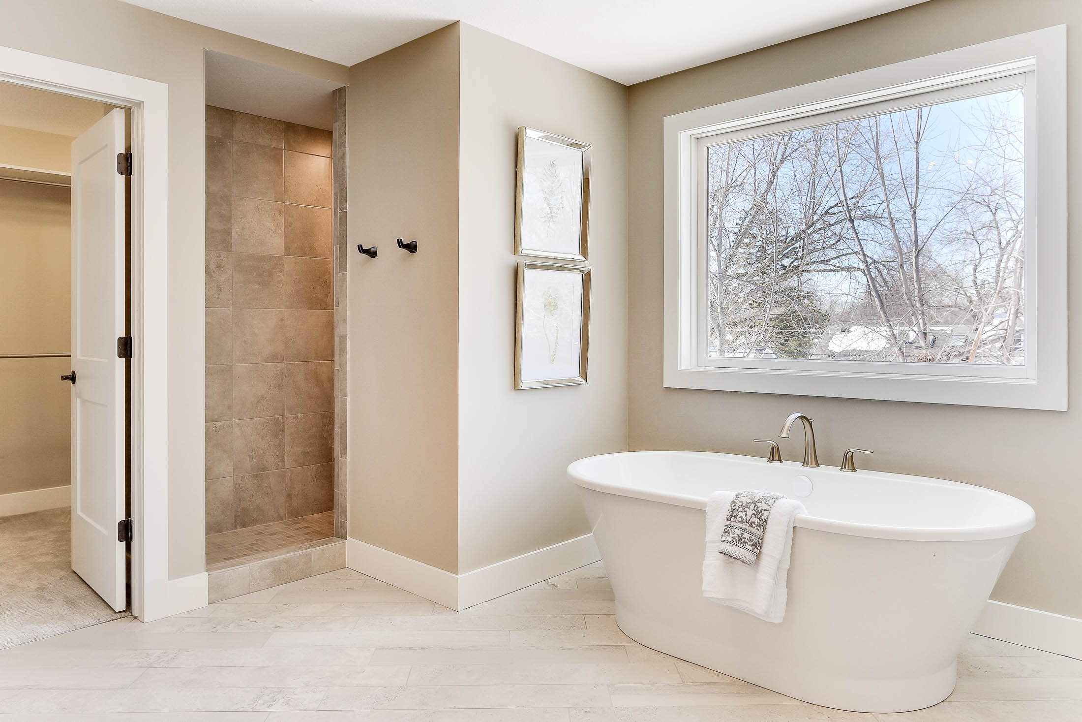 Spacious master bath with free standing tub